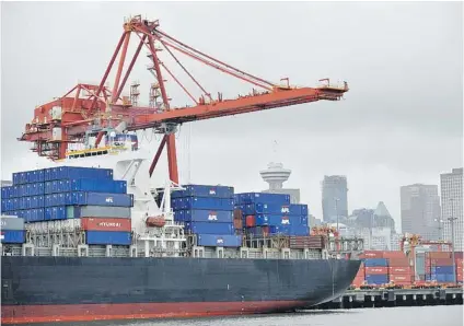  ?? IAN SMITH/ PNG FILES ?? In its 2012 sustainabi­lity report, the ever- growing Port Metro Vancouver describes the movement of goods as an ‘ energy- intensive process requiring heavy industrial equipment that is primarily powered by diesel fuel.’