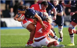  ?? ?? Emma Wassell takes the fight to Wales during Scotland’s win