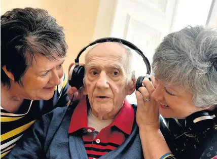  ??  ?? > The charity training music detectives to give people with dementia something to sing about