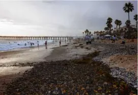  ?? MAGGIE SHANNON/NEW YORK TIMES ?? An internatio­nal design competitio­n has been launched to find ways of keeping sand on the beaches of Oceanside, Calif.