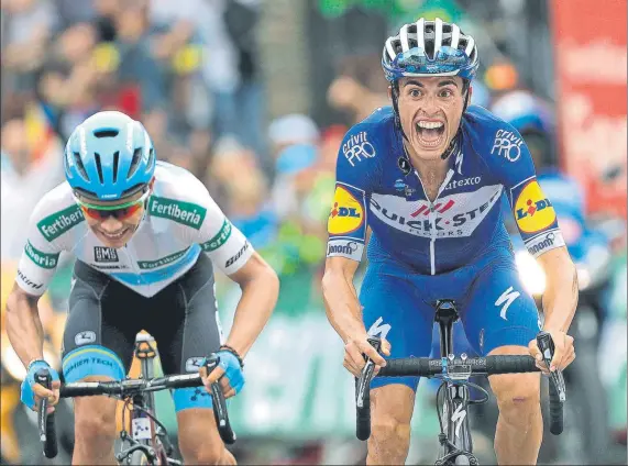  ?? FOTO: EFE ?? Enric Mas, a la derecha, supera al colombiano Miguel Ángel López en la línea de meta del Coll de la Gallina (Andorra), en el cierre de la 20ª etapa de la Vuelta