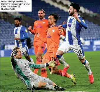  ??  ?? Dillon Phillips comes to Cardiff’s rescue with a fine save from Pipa of Huddersfie­ld