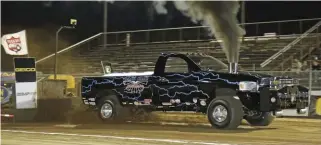  ??  ??  The Scheid Diesel Dodge took Kent Crowder to first place in the Super Stock class Friday with a 352-foot pull.