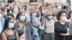  ?? AFP ?? Protesters take part in a Black Lives Matter march in Frankfurt am Main, Germany last month.