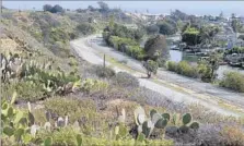  ?? Allen J. Schaben Los Angeles Times ?? AN ATTORNEY for Newport Banning Ranch LLC said the developer will continue its lawsuit after a state board rejected its plans.