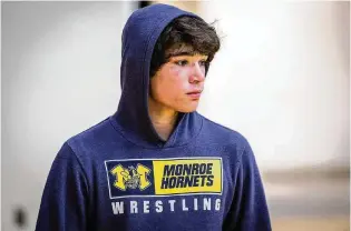  ?? AJ FULLAM / CONTRIBUTE­D ?? Monroe High School junior Nathan Moser makes his second straight trip to the Division I state wrestling tournament this weekend in Columbus.