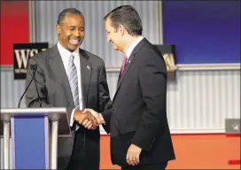  ?? SCOTT OLSON / GETTY IMAGES ?? Presidenti­al candidates Ben Carson (left) and Sen. Ted Cruz, R-Texas, speak Tuesday after the Republican presidenti­al debate in Milwaukee. At the debate, Cruz criticized a sugar subsidy program that Sen. Marco Rubio supports.