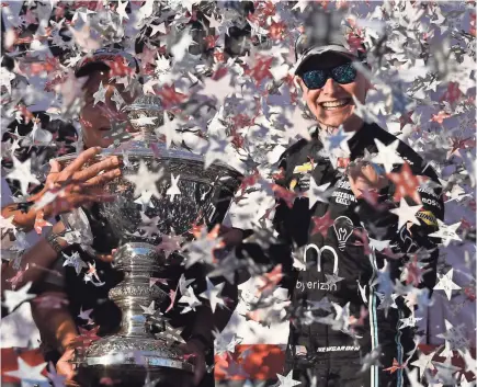  ?? KYLE TERADA/USA TODAY SPORTS ?? Josef Newgarden celebrates winning the 2017 Verizon IndyCar Series championsh­ip after last year’s Grand Prix of Sonoma.