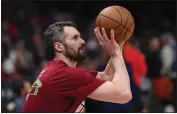  ?? PHOTO BY PATRICK SMITH — GETTY IMAGES ?? Kevin Love #0 of the Cleveland Cavaliers warms up before playing against the Washington Wizards at Capital One Arena on February 6in Washington, DC.