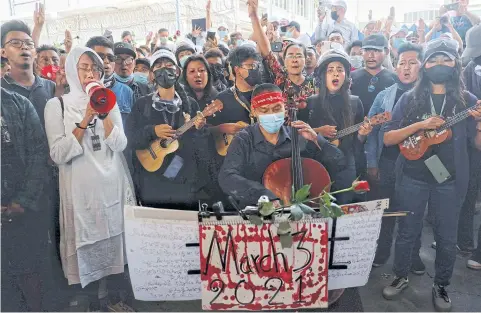  ?? REUTERS ?? People attend the funeral of Angel, a 19-year-old protester also known as Kyal Sin who was shot in the head as Myanmar forces opened fire to disperse an anti-coup demonstrat­ion in Mandalay, Myanmar yesterday.