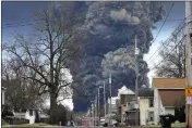  ?? GENE J. PUSKAR — THE ASSOCIATED PRESS FILE ?? A plume rises over East Palestine, Ohio, as a result of the controlled detonation of a portion of the derailed Norfolk Southern trains on Feb. 6.