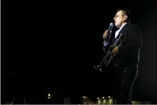  ?? PHOTO VINCENT OSUNA ?? Mariano Velez III of Mariachi Acero Del Valle sings on stage during the annual Mariachi Night event held Wednesday night on Main Street in Brawley.