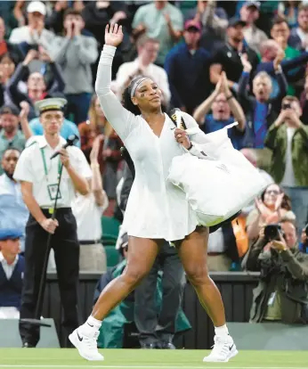  ?? JOHN WALTON/PA VIA AP ?? Serena Williams waves to the crowd Tuesday after what may have been her final match at Wimbledon.