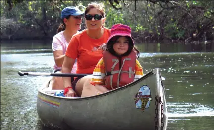  ?? JOHN BRILEY — FOR THE WASHINGTON POST ?? The author’s daughter, Christina, and his sisters, Rachel Briley, left, and Gina Space, float through Hillsborou­gh River State Park outside Tampa in 2017.