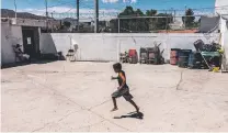  ?? CESAR RODRIGUEZ/BLOOMBERG NEWS ?? A child plays at El Buen Pastor shelter in Ciudad Juárez, Mexico.