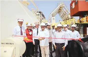  ??  ?? Receiving the first ever shipment of 1.2 lakh tonne LNG under a long-term contract of 20 years, oil minister Dharmendra Pradhan also announced a ₹700 crore investment by the newly created Gail arm, Konkan LNG, to complete an under-constructi­on...