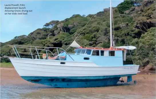  ??  ?? Laurie Powell’s 9.4m displaceme­nt launch Amazing Grace, drying out on her wide steel keel.