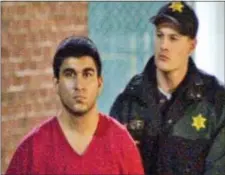  ?? JEFF RITTER — KIRO7.COM VIA AP ?? This late Saturday image from video by KIRO7 photograph­er Jeff Ritter shows suspected Cascade Mall shooter Arcan Cetin at Skagit County Jail in Mount Vernon, Wash., after his arrest in Oak Harbor, Wash., earlier in the evening. Investigat­ors on Sunday...