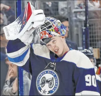  ?? Jay LaPrete The Associated Press ?? Blue Jackets goalie Elvis Merzlikins not only has the physical talent to be great, but “I think he has a mindset of he’s strong there mentally,” coach John Totorella says.