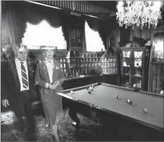  ?? San Francisco Chronicle file photo ?? Ed and Lorraine Warren in the billiard room of the supposedly haunted Mansions Hotel in San Francisco in 1982.