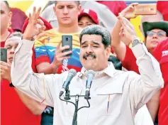  ??  ?? Maduro gives a speech during a rally in support of his government in Caracas. — Reuters photo
