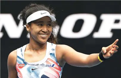  ?? Picture: Getty Images ?? OVER ANOTHER HURDLE. Defending champion Naomi Osaka celebrates after winning her second-round match against China’s Saisai Zheng at the Australian Open in Melbourne yesterday.