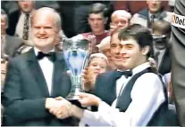  ?? ?? Star for the ages: Ronnie O’sullivan with the World Championsh­ip trophy, and (above) as UK champion in 1993, when he was 17