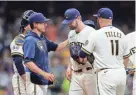  ?? GETTY IMAGES ?? Brewers right-hander Adrian Houser will miss at least two starts after testing positive for COVID-19.