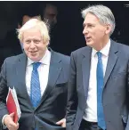  ?? Picture: PA. ?? Foreign Secretary Boris Johnson, left, and Chancellor Philip Hammond leave No 10.