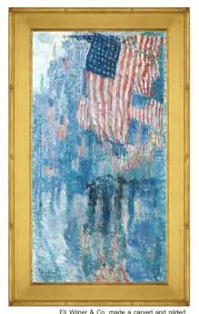  ??  ?? Eli Wilner & Co. made a carved and gilded replica of the artist-designed frame for Childe Hassam’s Avenue in the Rain that is in the collection of the White House.