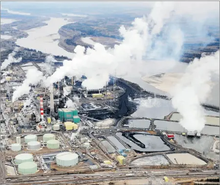  ?? MARK RALSTON, Afp/getty Imag es, file ?? Oilsands developmen­t in Alberta is expected to create 700,000 jobs by 2035, which means companies need to work
now to develop strategic ways of attracting the right employees.