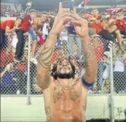  ?? AFP ?? Panama's Roman Torres takes a selfie with fans celebratin­g in the background after he scored against Costa Rica on Tuesday.