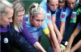  ?? Photograph: Chloe Knott/Danehouse/Getty Images ?? The Manchester City captain, Steph Houghton, leads a team talk.