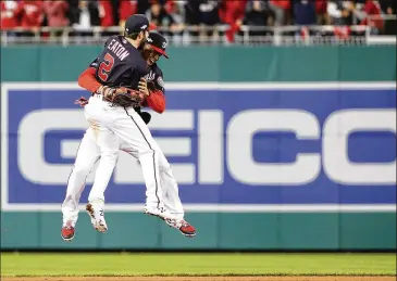  ?? PATRICK SMITH / GETTY IMAGES ?? Nationals outfielder­s Juan Soto and Adam Eaton celebrate after winning Game 4 of the National League Championsh­ip Series and finishing a 4-0 sweep of the Cardinals at Nationals Park on Tuesday.