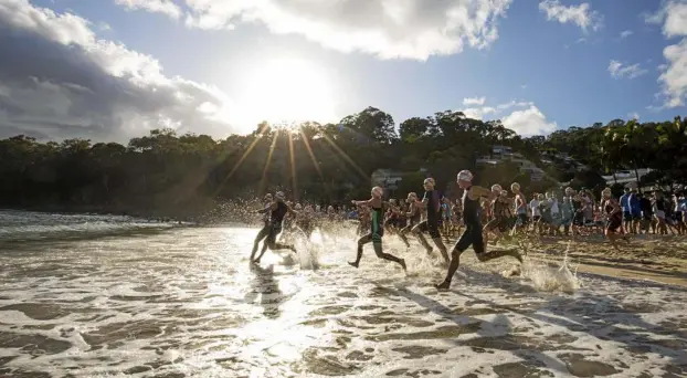  ?? PHOTO: BARRY ALSOP/EYES WIDE OPEN IMAGE ?? CROWD FAVOURITE: The Noosa Triathlon is as popular as ever.