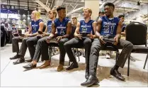  ?? ALLEN EYESTONE / PALM BEACH POST ?? Wellington’s Dane Stratton (from left), Jadien Durant, Balitan Celestin, Austin Wallace and Mark-Antony Richards await their turn at the Dolphins high school media day.