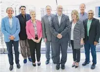  ?? Elizabeth Conley/Staff photograph­er ?? President and CEO Phil McDivitt, fourth from right, leads a firm that increased its sales 75 percent in 2021.