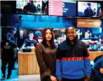  ??  ?? Cameroonia­n entreprene­ur couple - Walter, 37, and Cindy, 32, Tchassem - pose during an interview with AFP at an outlet of the couple’s Black Star burger chain on Moscow’s Novy Arbat.