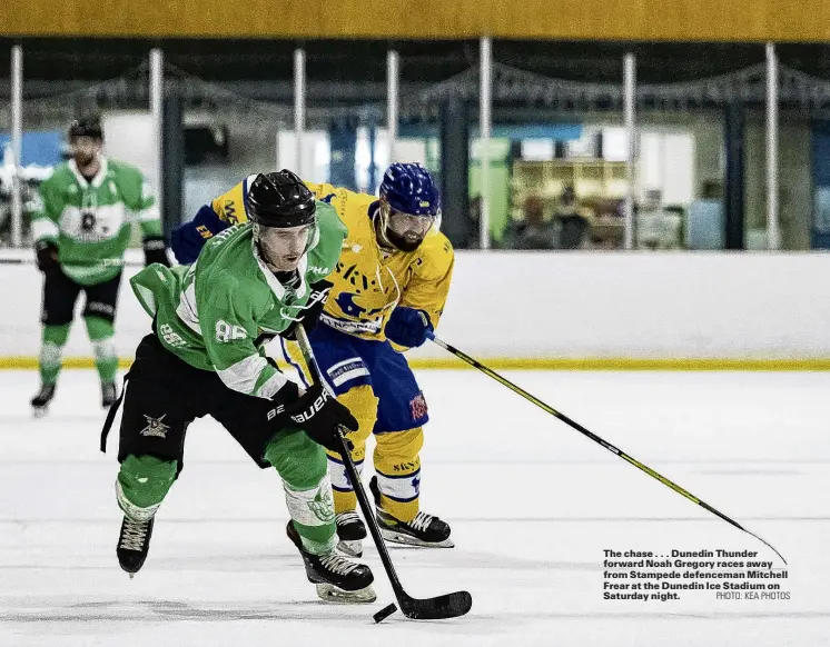  ?? PHOTO: KEA PHOTOS ?? The chase . . . Dunedin Thunder forward Noah Gregory races away from Stampede defenceman Mitchell Frear at the Dunedin Ice Stadium on Saturday night.