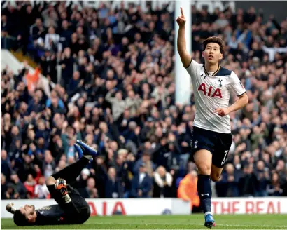  ?? AP ?? Tottenham’s Heung-min Son celebrates after scoring a goal against Millwall during the FA Cup quarterfin­al. —