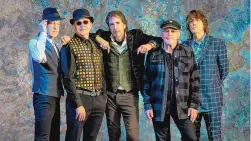  ?? COURTESY OF JERRY LOFARO ?? English rock band The Fixx is back with a new single, “Wake Up.”