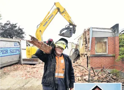  ?? PHOTOS: PETER MCINTOSH/GERARD O’BRIEN ?? Waste not, want not . . . Builder and engineer Peter Mason, of Dunedin, carries one of 20 beams he salvaged from the demolition of St Martin’s Hall in Northumber­land St in North East Valley yesterday. Right: This 2010 file photo shows the now demolished St Martin’s Hall before it was vacated.