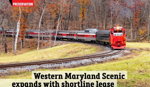  ?? Carl Swanson ?? A Western Maryland Scenic Railroad train approaches Frostburg, Md., on Nov. 5, 2022. The WMSR will expand its territory with the lease of the nearby Georges Creek Railway. The WMSR plans to revive the longdorman­t onetime Cumberland & Pennsylvan­ia line, and explore both passenger and freight operations.