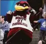  ?? Charlie Neibergall / Associated Press ?? The South Carolina mascot is seen in the stands during Saturday’s practice.