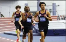  ?? COURTESY PENN STATE ATHLETICS ?? Darius Smallwood (Pottstown), right, runs the 800meters at the Sykes & Sabock Challenge at Penn State on Feb. 4.