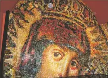  ?? KATRINA KOKJOHN ?? “Look Into Eternity” is a 23- by 23-foot mosaic of the Virgin Mary made of 15,000 hand-painted eggs. It is in a cathedral in Kiev.