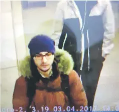  ??  ?? A still image of suspect Djalilov walking at St Petersburg’s metro station is shown in this police handout photo obtained by 5th Channel Russia. — Reuters photo
