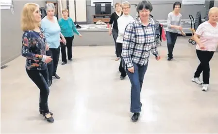  ?? CONTRIBUTE­D ?? Members of the Black Rock line dancers practise their steps during a pre-COVID get-together at the Big Bras d’Or fire hall. Nowadays, the group keeps up with the latest moves during a twice-weekly online practice session.