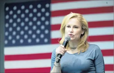  ?? Mary Altaffer Associated Press ?? HEIDI CRUZ introduces her husband last week in Wilton, Iowa. “I would’ve thought that she would have wanted to be the politician, rather than be the politician’s wife,” a Claremont McKenna College friend says.