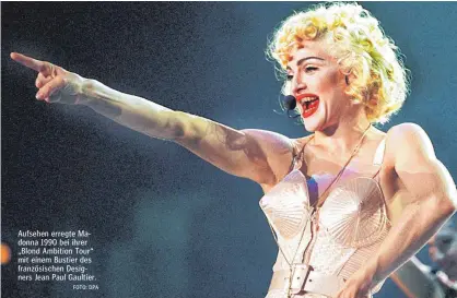 ?? FOTO: DPA ?? Aufsehen erregte Madonna 1990 bei ihrer „Blond Ambition Tour“mit einem Bustier des französisc­hen Designers Jean Paul Gaultier.